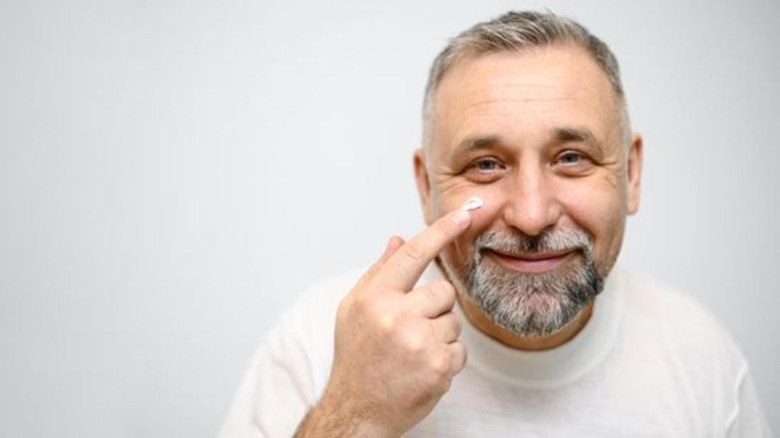 Old man using Korean skincare for mature skin